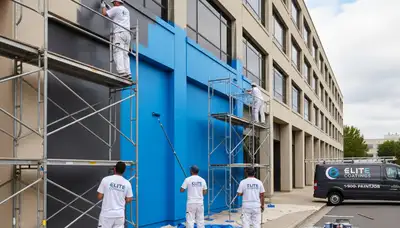 Professional commercial painters coating office exterior in West Palm Beach FL for lasting coastal protection