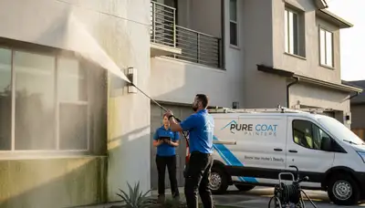 Professional pressure cleaning service restoring home exterior in West Palm Beach FL